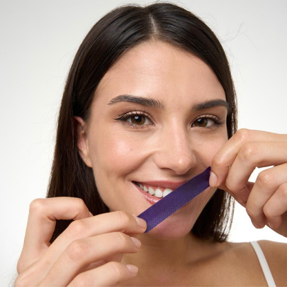 Tiras blanqueadoras de dientes moradas